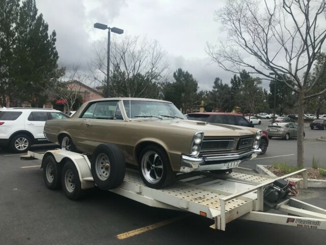 1965 Gold Pontiac GTO Coupe