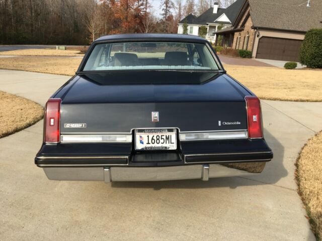 1984 Black Oldsmobile Cutlass Coupe