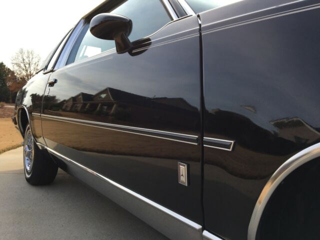 1984 Black Oldsmobile Cutlass Coupe
