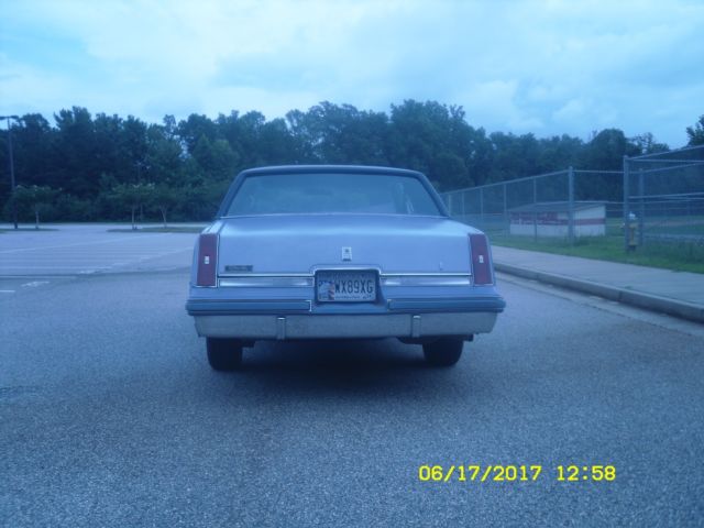 1984 Blue Oldsmobile Cutlass Coupe