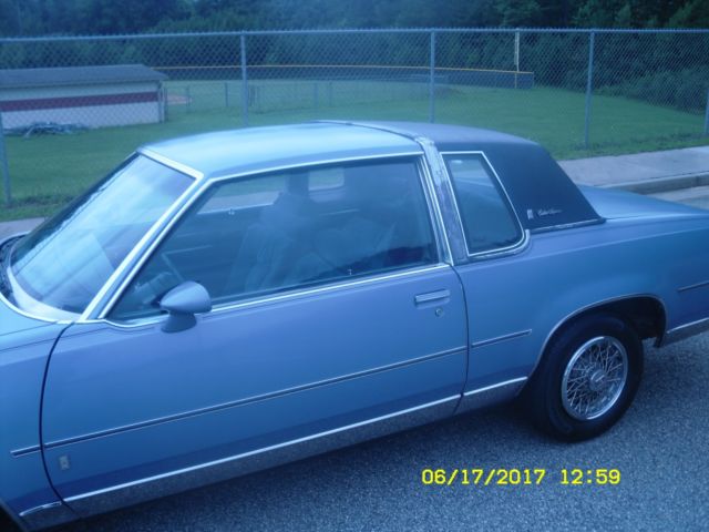 1984 Blue Oldsmobile Cutlass Coupe