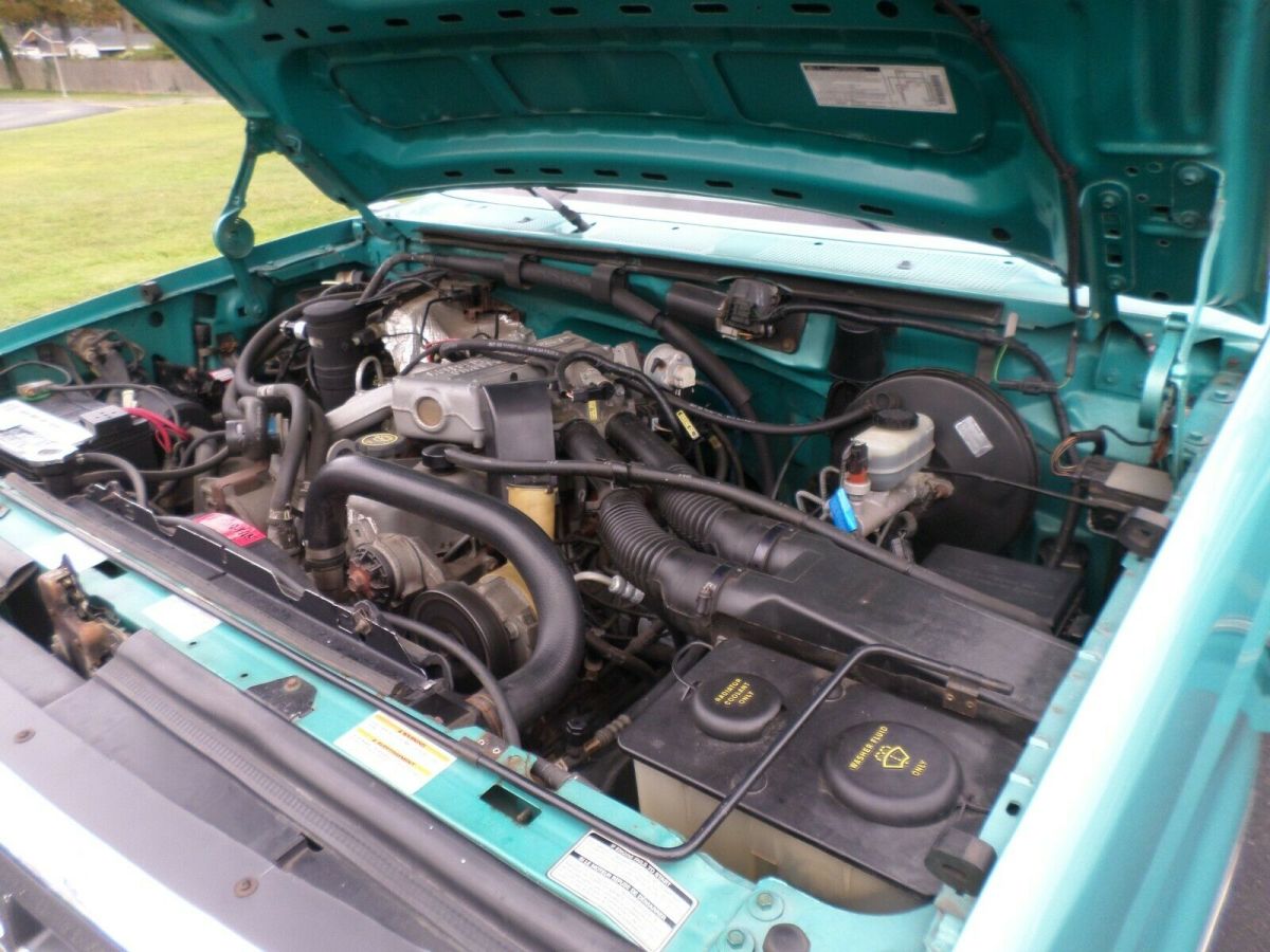 1994 Teal Ford F-150 Standard Cab Pickup
