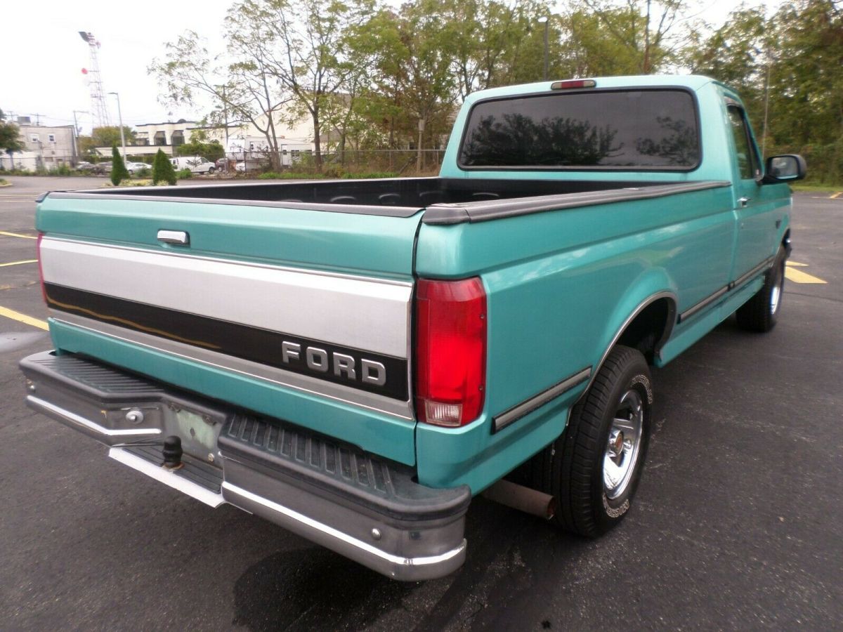 1994 Teal Ford F-150 Standard Cab Pickup