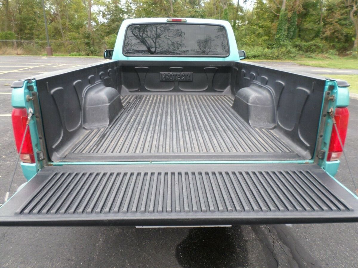 1994 Teal Ford F-150 Standard Cab Pickup