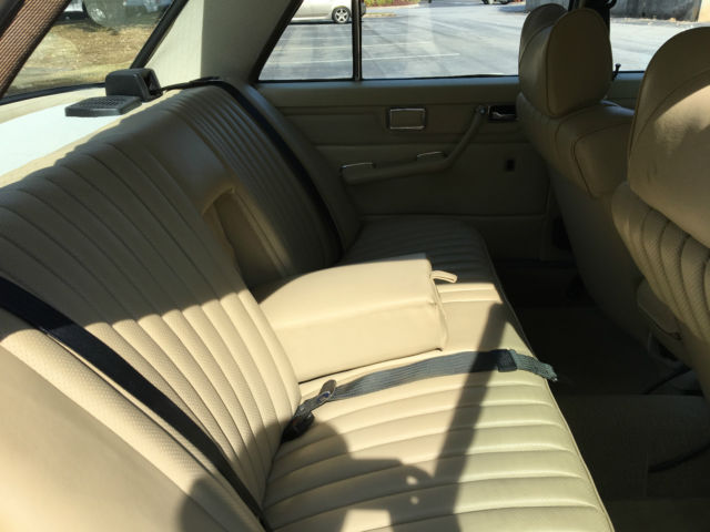 1974 White Mercedes-Benz 200-Series Sedan