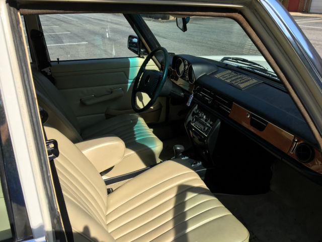 1974 White Mercedes-Benz 200-Series Sedan