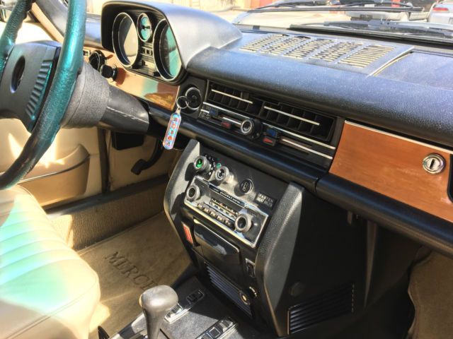 1974 White Mercedes-Benz 200-Series Sedan