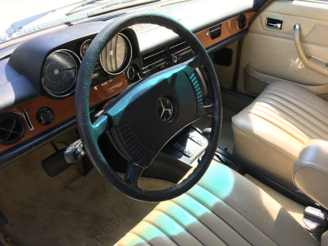 1974 White Mercedes-Benz 200-Series Sedan