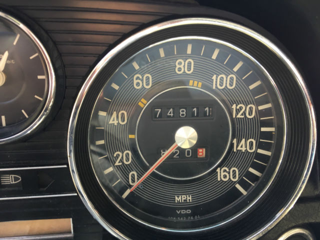 1974 White Mercedes-Benz 200-Series Sedan