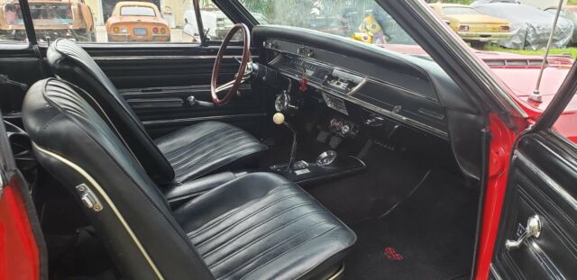 1966 red Chevrolet Chevelle Convertible