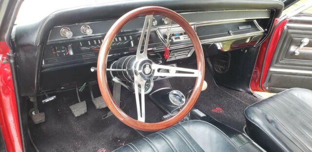 1966 red Chevrolet Chevelle Convertible