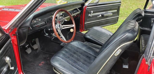 1966 red Chevrolet Chevelle Convertible