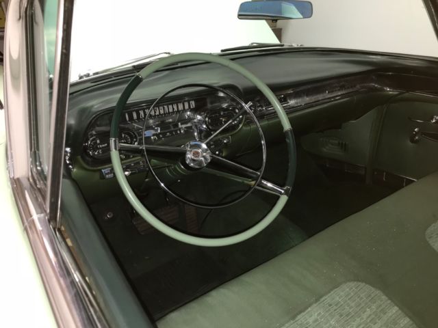 1958 Green Cadillac Series 62 Coupe