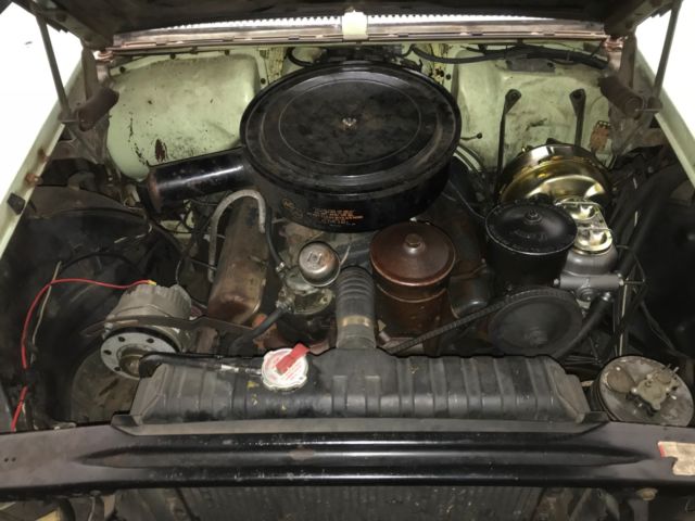 1958 Green Cadillac Series 62 Coupe