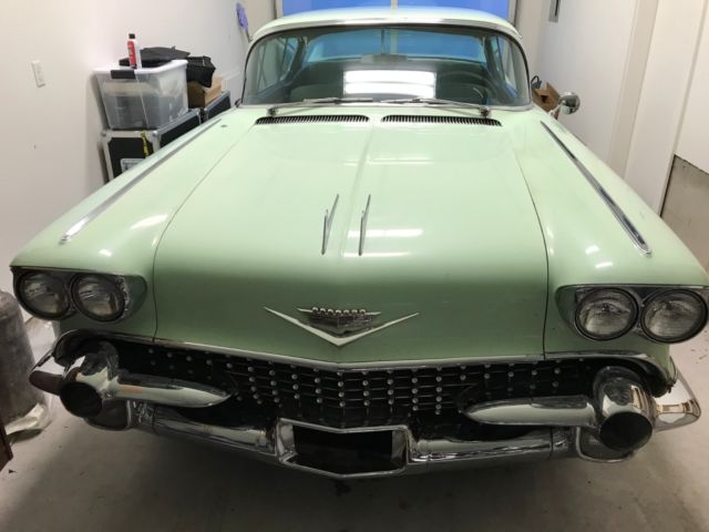 1958 Green Cadillac Series 62 Coupe