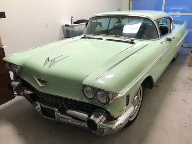 1958 Green Cadillac Series 62 Coupe