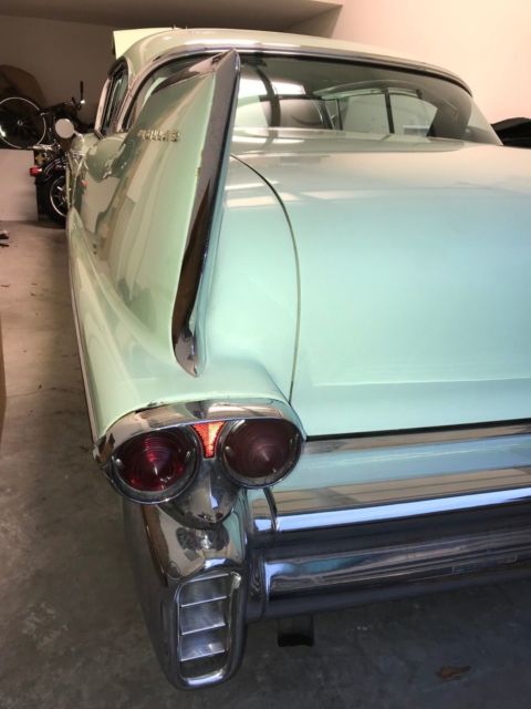 1958 Green Cadillac Series 62 Coupe