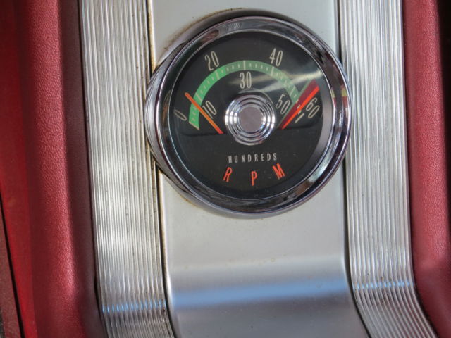 1962 Red/White top Oldsmobile Starfire Coupe