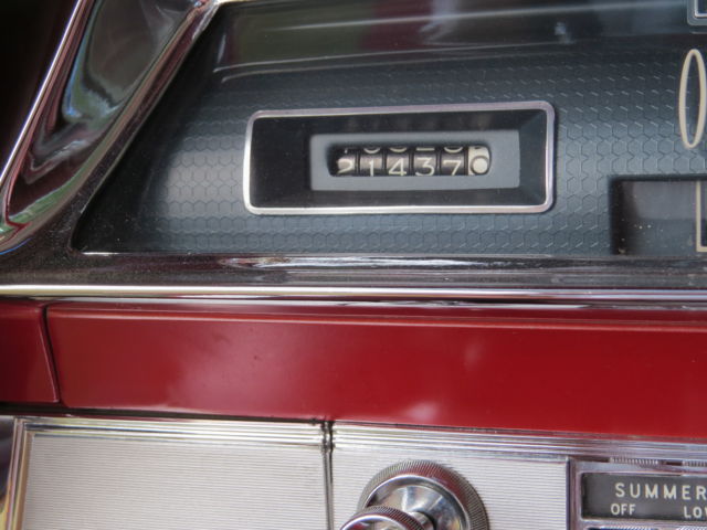 1962 Red/White top Oldsmobile Starfire Coupe