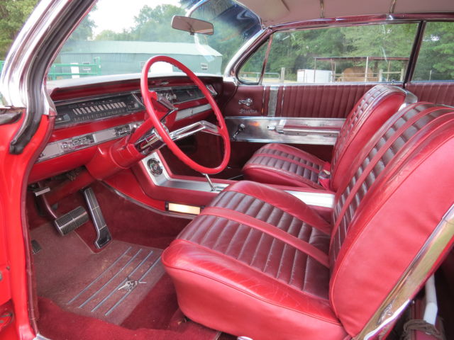 1962 Red/White top Oldsmobile Starfire Coupe