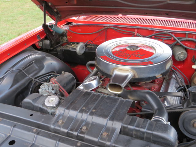 1962 Red/White top Oldsmobile Starfire Coupe