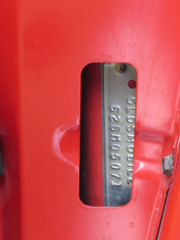 1962 Red/White top Oldsmobile Starfire Coupe