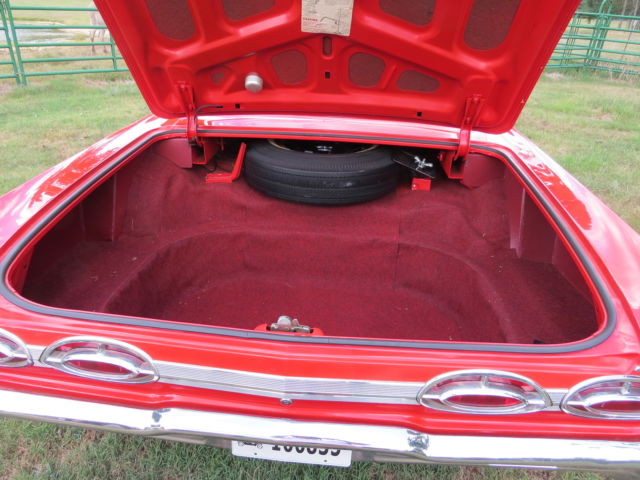 1962 Red/White top Oldsmobile Starfire Coupe
