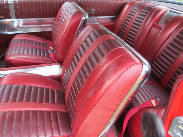 1962 Red/White top Oldsmobile Starfire Coupe