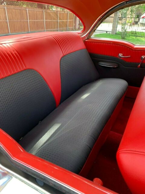 1956 Red/White Oldsmobile Eighty-Eight Sedan