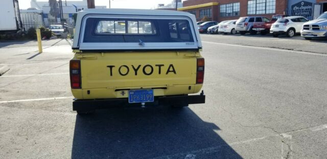 1979 Yellow Toyota Hilux Extended Cab Pickup