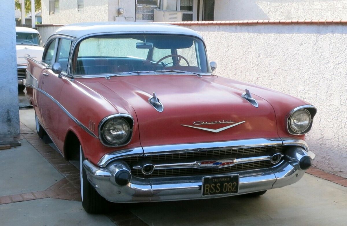 1957 Red and White Chevrolet Bel Air/150/210 Coupe