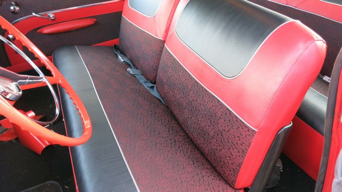 1957 Red and White Chevrolet Bel Air/150/210 Coupe