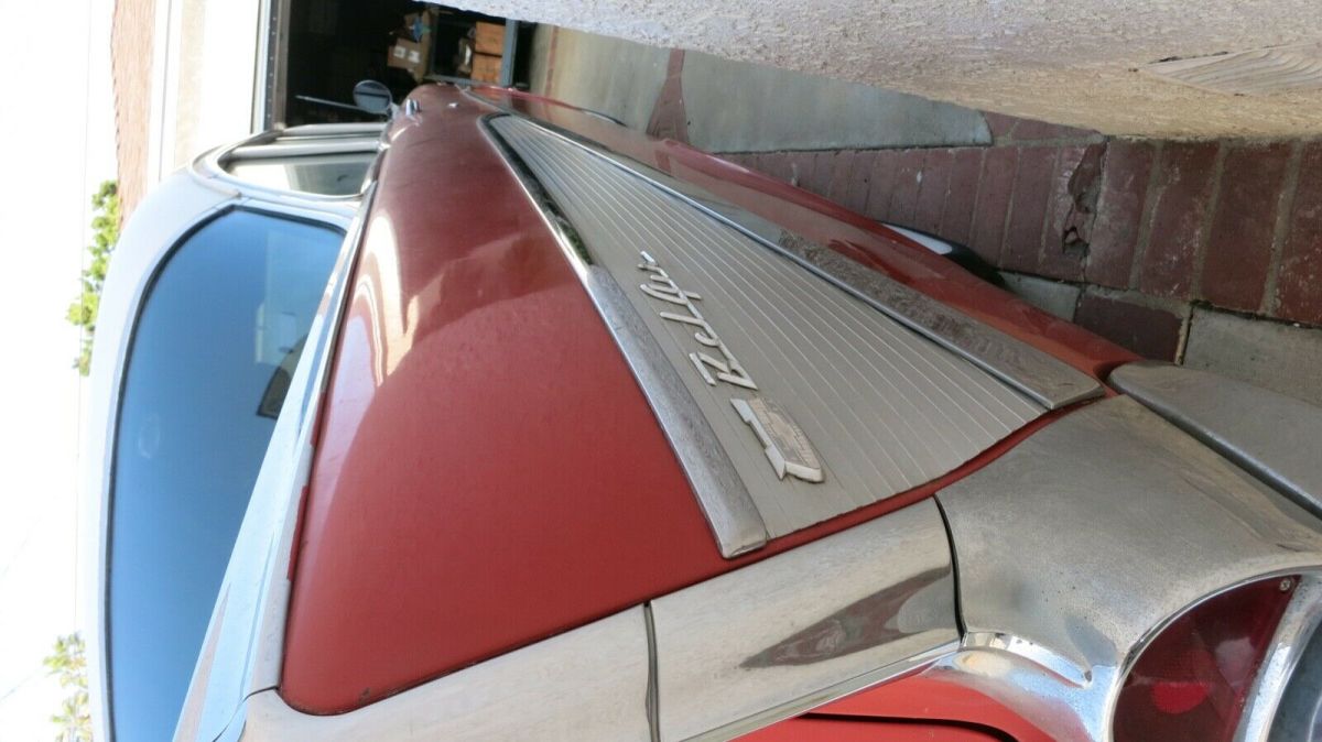 1957 Red and White Chevrolet Bel Air/150/210 Coupe