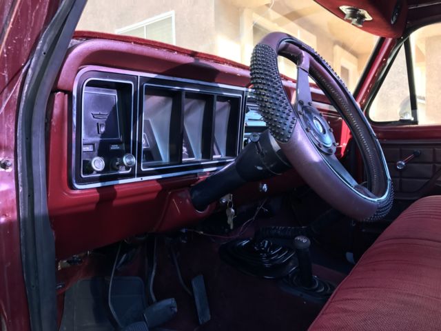 1977 black and red Ford F-150 Standard Cab Pickup