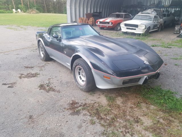 1978 black and silver Chevrolet Corvette