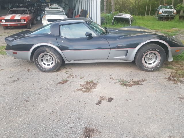 1978 black and silver Chevrolet Corvette