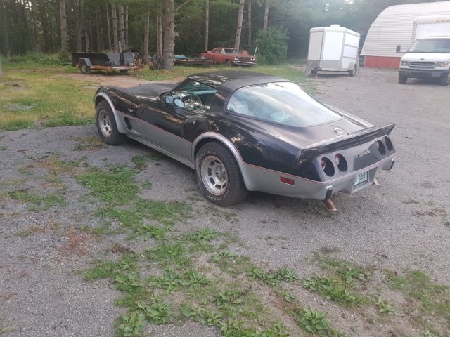 1978 black and silver Chevrolet Corvette