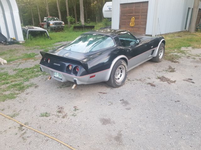 1978 black and silver Chevrolet Corvette