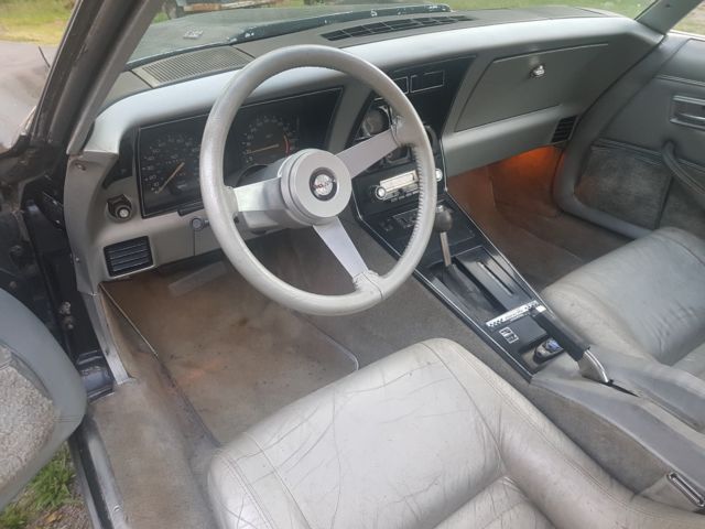 1978 black and silver Chevrolet Corvette