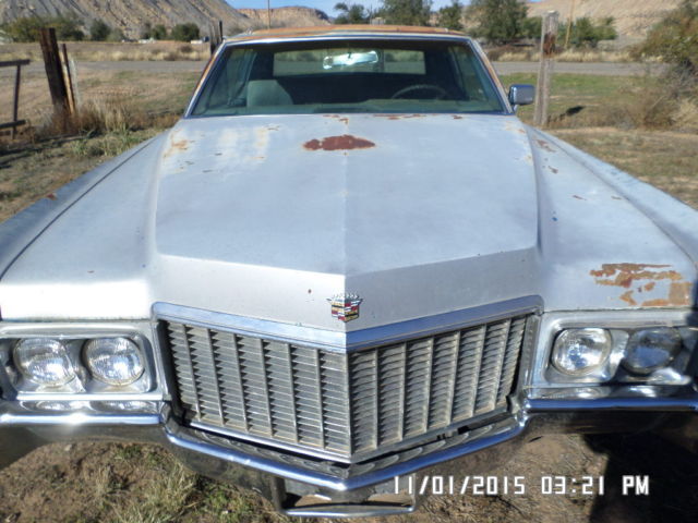 1970 silver Cadillac DeVille Coupe