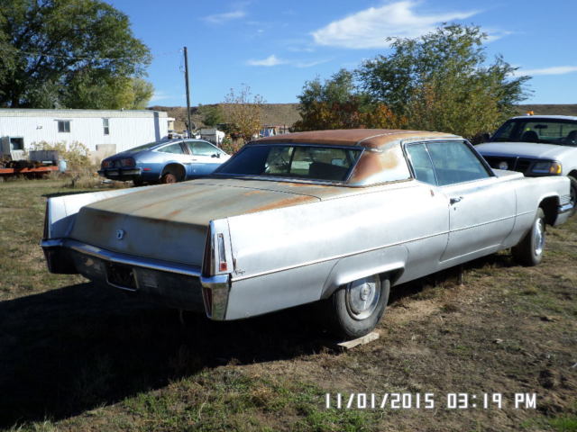 1970 silver Cadillac DeVille Coupe