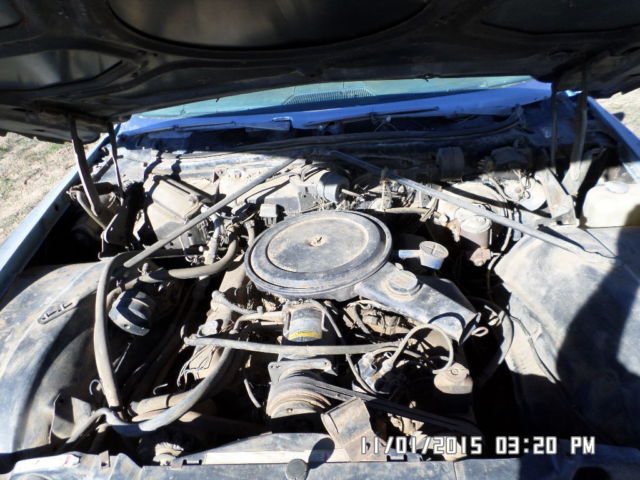 1970 silver Cadillac DeVille Coupe