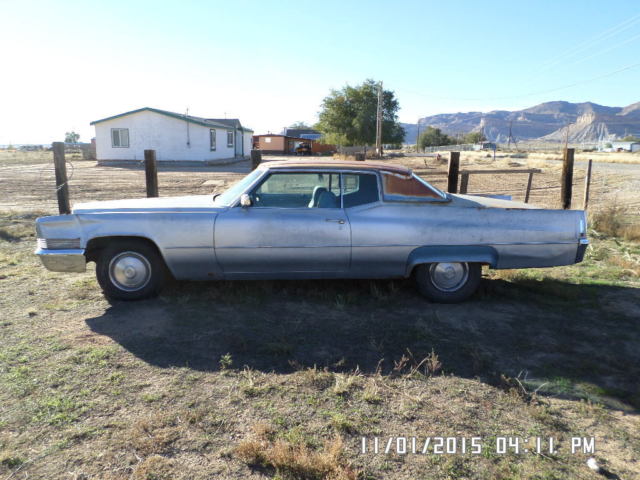 1970 silver Cadillac DeVille Coupe