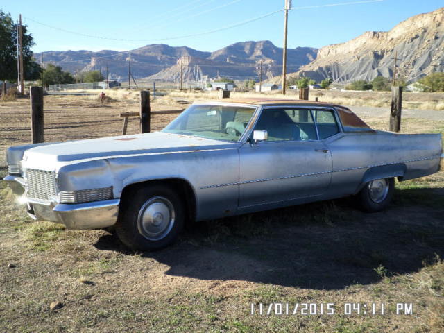 1970 silver Cadillac DeVille Coupe