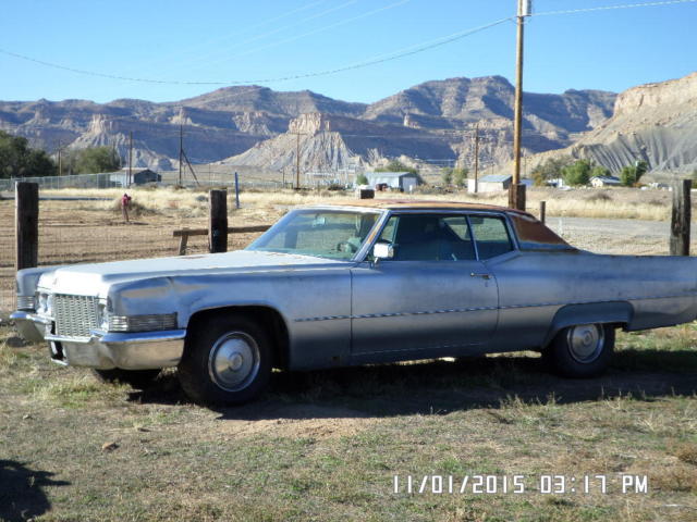 1970 silver Cadillac DeVille Coupe