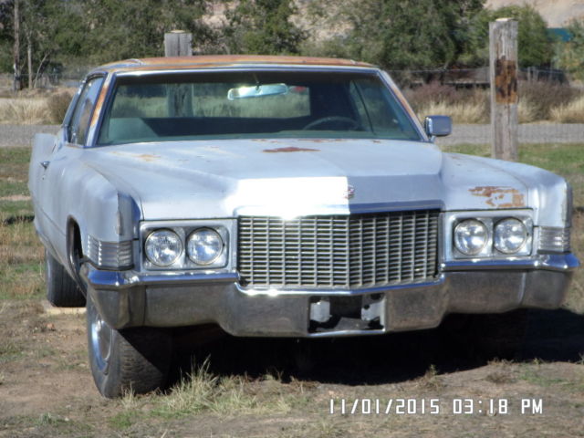 1970 silver Cadillac DeVille Coupe
