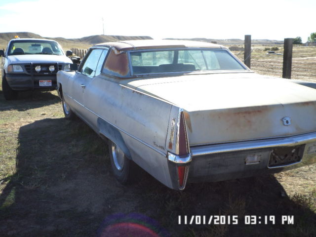 1970 silver Cadillac DeVille Coupe