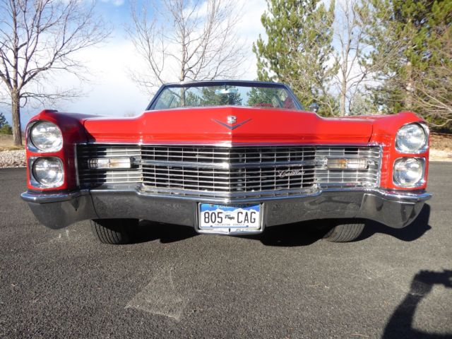 1966 red Cadillac DeVille Convertible