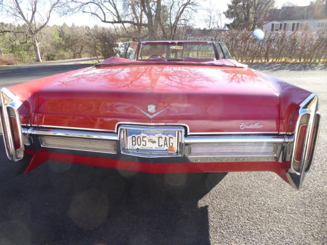 1966 red Cadillac DeVille Convertible