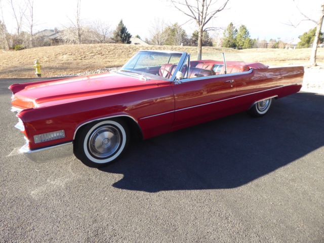 1966 red Cadillac DeVille Convertible